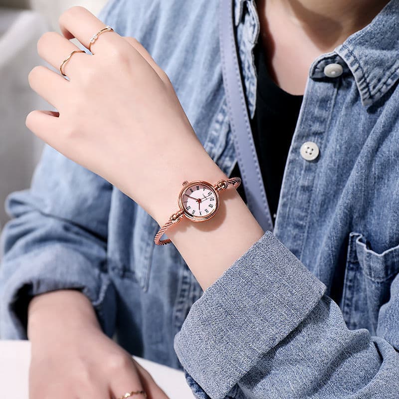 Small Round Roman Dial Bangle Watch for Women, Rose Gold, worn on the wrist