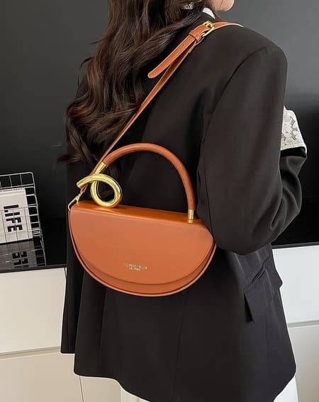 Half Moon Crossbody Bag with Gold Handle, Brown, worn across the body